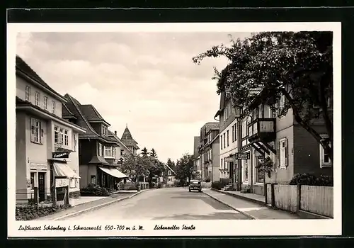 AK Schömberg i. Schwarzwald, Liebenzeller Strasse mit Geschäften