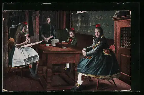 AK Hessische Tracht, Drei Frauen mit Mädchen am Tisch