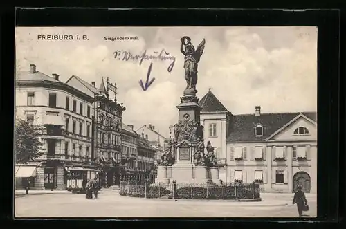 AK Freiburg i. B., Strassenbahn am Siegesdenkmal