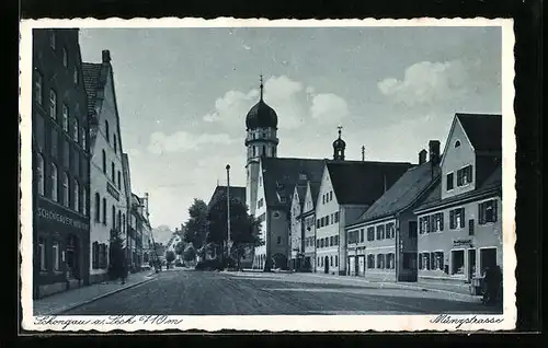 AK Schongau a. Leck, Münzstrasse mit Geschäften und Kirche