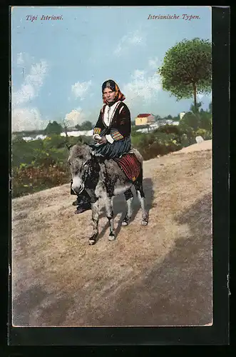 AK Istrianische junge Frau in Tracht auf einem Esel