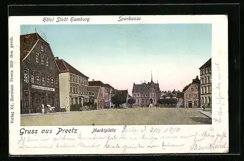 Goldfenster-AK Preetz, Marktplatz, Hotel Stadt Hamburg, Sparkasse, Gebäude mit leuchtenden Fenstern