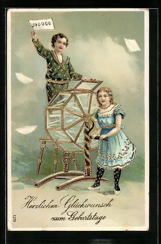 Künstler-AK Knabe und Mädchen an einer Lostrommel, Geburtstagsgruss