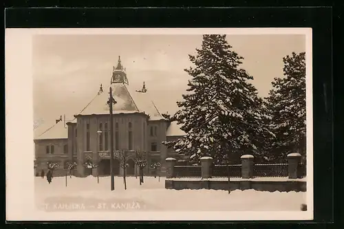 AK St. Kanjiza, Ortspartie mit Kirche im Schnee
