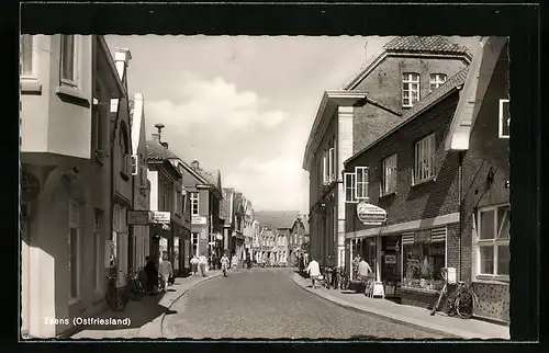 AK Esens i. Ostfriesand, Strassenpartie mit Friseur