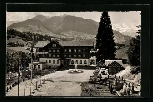 AK Bad Heustrich, Ortsansicht mit Bergblick
