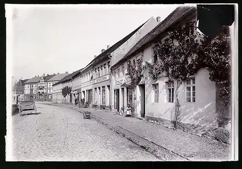 Fotografie Brück & Sohn Meissen, Ansicht Liebenwerda, Partie in der Hainsche Strasse mit Geschäften, 1904