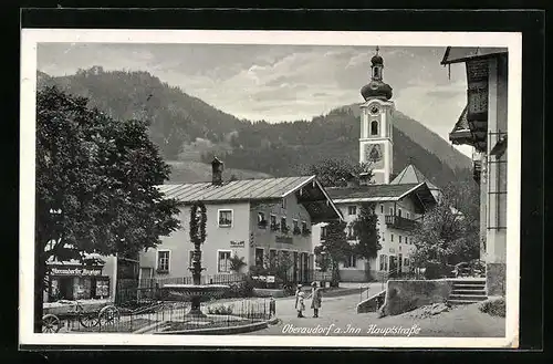 AK Oberaudorf a. Inn, Partie in der Hauptstrasse mit Blick auf die Kirche
