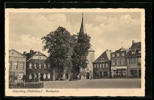 AK Lütjenburg /Ostholstein, Marktplatz mit Kirche
