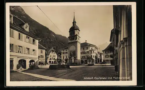 AK Altdorf, Strassenbahn auf dem Dorfplatz mit Telldenkmal