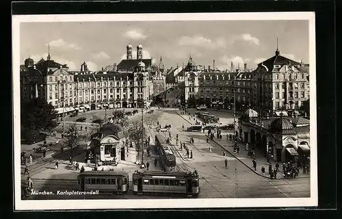 AK München, Strassenbahnen im Karlsplatzrondell