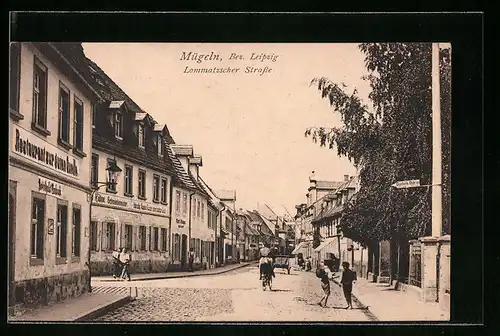 AK Mügeln, Lommatzscher Strasse mit Restaurant zur guten Quelle