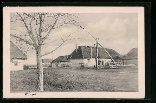 AK Wolczek, Brunnen auf der Dorfstrasse