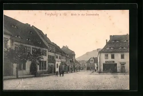 AK Freyburg a. U., Blick in die Steinstrasse mit Geschäft von Paul Kirchberg