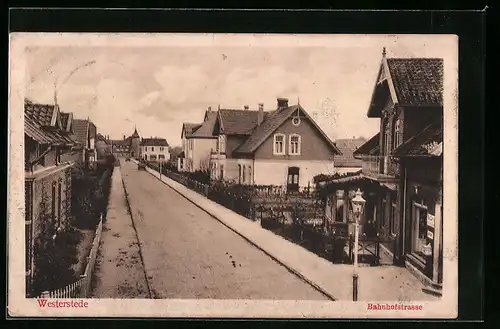 AK Westerstede, Bahnhofstrasse mit Geschäft