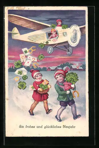 Künstler-AK Glücksbringerbomber, Neujahrsgruss, Flugzeug