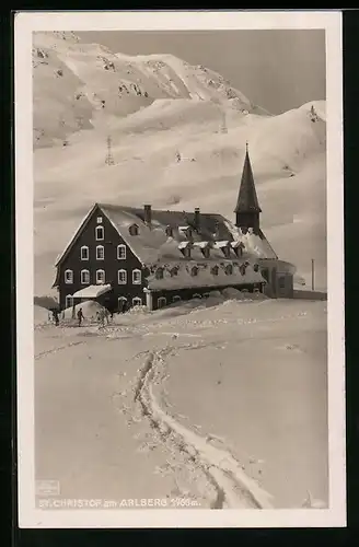 AK St. Christoph /Arlberg, Haus und Kirche im Schnee