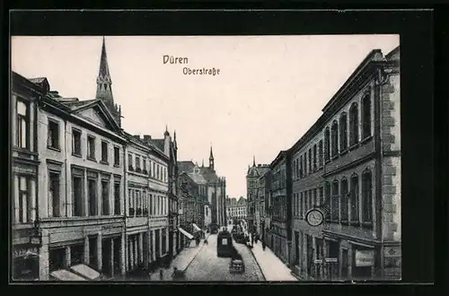 AK Düren, Oberstrasse mit Autos und Turmspitzen