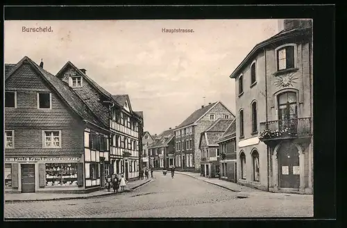 AK Burscheid, Hauptstrasse mit Porzellanwarengeschäft von Paula Kraus