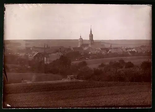 Fotografie Brück & Sohn Meissen, Ansicht Mügeln i. Sa., Blick auf die Stadt mit der Kirche