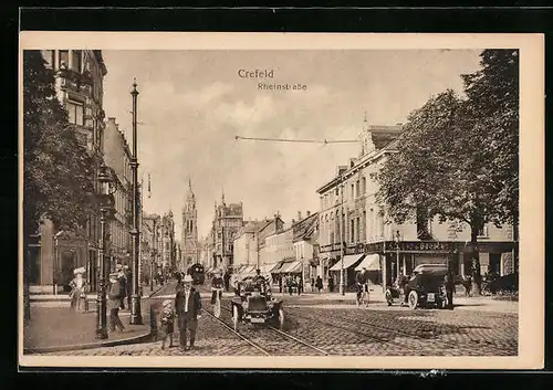 AK Krefeld, Rheinstrasse mit Geschäften