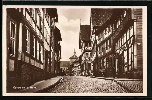 AK Osterode / Harz, Ortspartie an alten Fachwerkhäusern