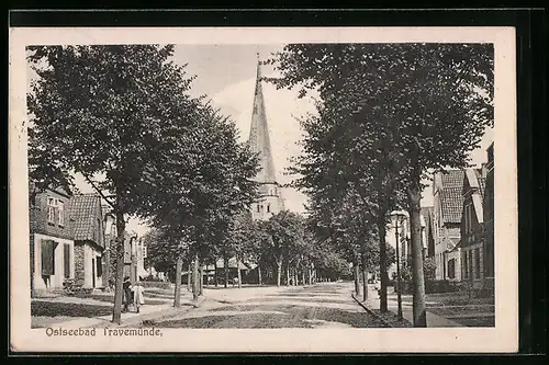 AK Travemünde, Strassenpartie mit Kirche