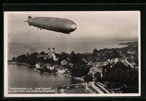 AK Friedrichshafen a. B., Luftschiff LZ 127 Graf Zeppelin über dem Bodensee