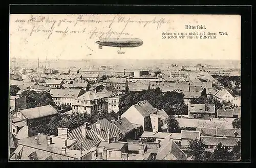 AK Bitterfeld, Luftschiff Zeppelin über der Stadt
