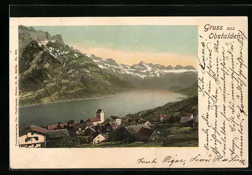 AK Obstalden, Ortsansicht mit Gewässer und Bergkette