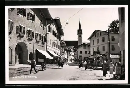 AK Golling bei Salzburg, Passanten am Cafe mit Blick zur Kirche