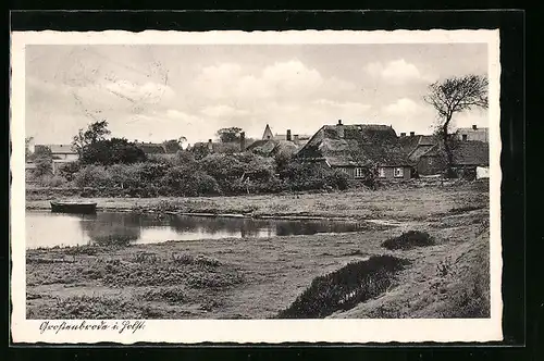 AK Grossenbrode i. Holst., Blick zum Ort mit Teich