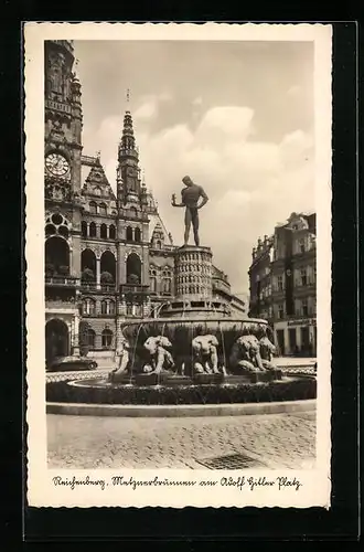 AK Reichenberg, Metznerbrunnen am  Platz