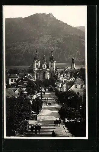 AK Haindorf i. B., Strassenpartie mit Blick zur Kirche