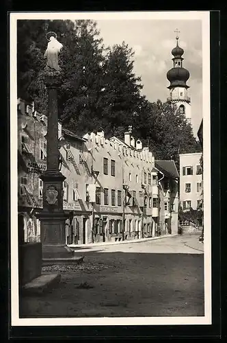 AK Brunico /Pusteria, Strassenpartie mit Mariensäule und Kirche