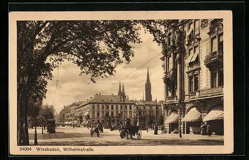 AK Wiesbaden, Wilhelmstrasse mit Strassenbahn