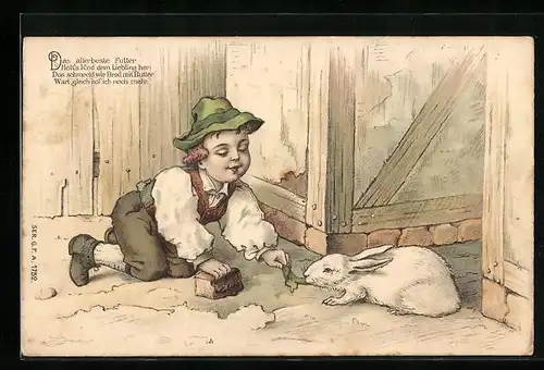 Präge-AK Kleiner Junge füttert sein Kaninchen