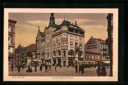 AK Karlsruhe, Partie beim Moninger mit Litfasssäule und Strassenbahn