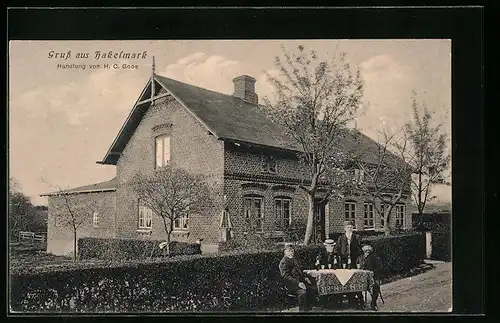 AK Hakelmark / Thumby, Handlung von H. C. Goos mit Tisch im Freien