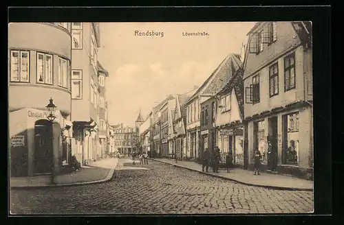 AK Rendsburg, Löwenstrasse mit Geschäften