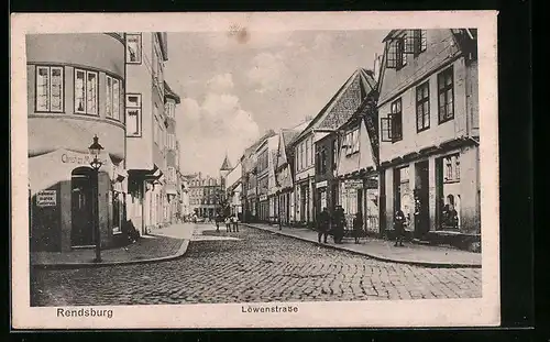 AK Rendsburg, Löwenstrasse mit Geschäften