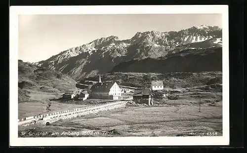 AK St. Christoph am Arlberg, Ortsansicht mit Gebirgskette