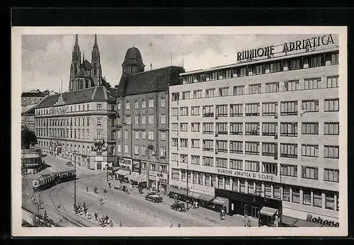 AK Brünn, Strassenpartie mit Geschäften und Strassenbahn