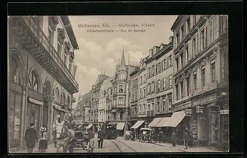 AK Mülhausen /Els., Wildemannstrasse mit Geschäften und Strassenbahn