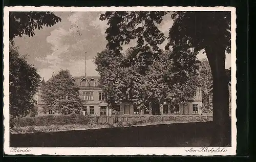 AK Bünde i. W., Häuserfront am Kirchplatz