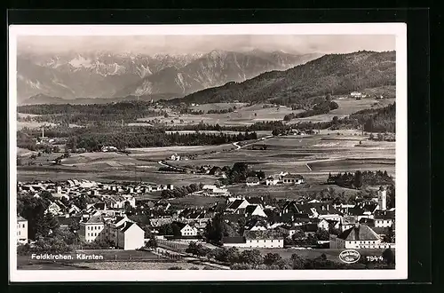 AK Feldkirchen, Totalansicht des Ortes mit Alpenpanorama