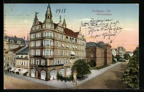 AK Freiburg i. Br., Holzmarktplatz mit Litfasssäule