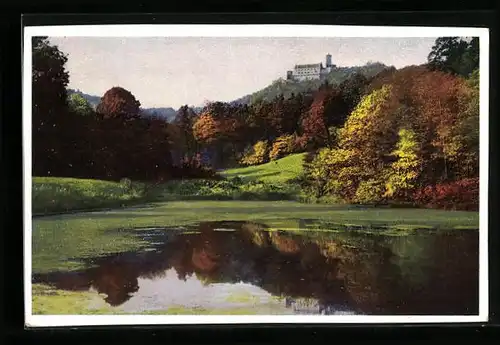 Künstler-AK Photochromie Serie 345, Nr. 5002: Blick von einem See auf eine Schloss