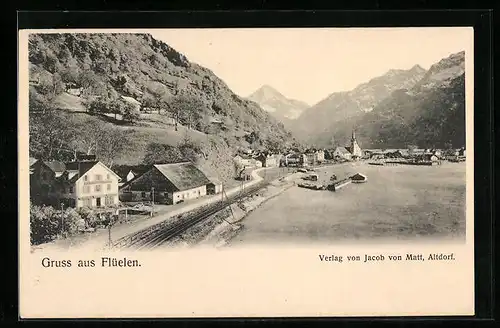 AK Flüelen, Totalansicht mit Bahngleisen