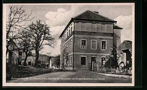 AK St. Oswald, Hauptplatz mit Kriegerdenkmal und Schule